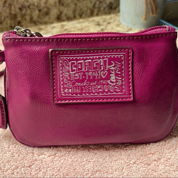 Coach
Poppy Plum/Purple Patent Leather Wristlet - Picture 3 of 7